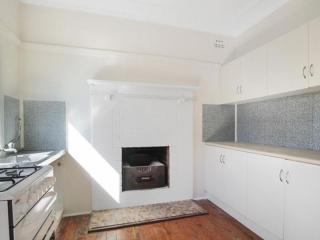 View profile: Charming 3-Bedroom Home with a Sunny Sunroom and Enclosed Backyard in Coniston, NSW